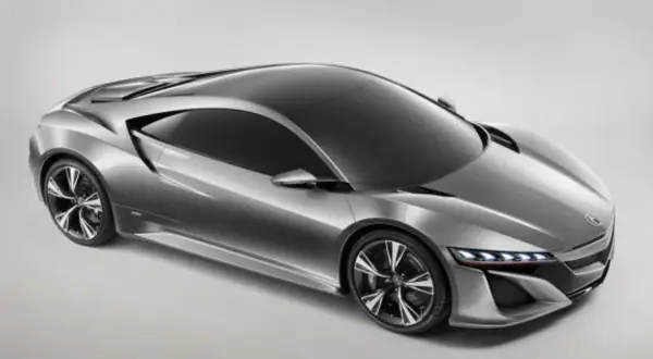 Srebrny, futurystyczny Honda NSX z ostrymi liniami i sportowymi felgami, gotowy do podboju dróg.