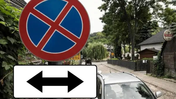 Znak zakazu zatrzymywania się z tabliczką wskazującą, że zakaz obowiązuje po obu stronach drogi.